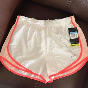 Nike Women’s White Athletic Shorts with Coral Trim